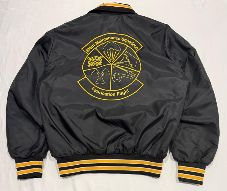 Black Bomber Jacket With Yellow Embroidery